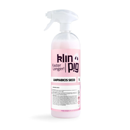 envase transparente con liquido rosa especial para limpiar bicis en seco 