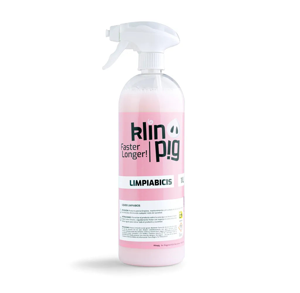 envase con liquido rosa dispensador en spray limpiabicis