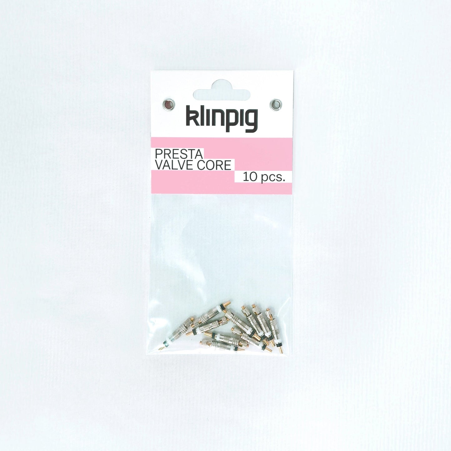 presta valve core 10 pcs. 10 piezas klinpig sobre paquete k l i n p i g rosa fondo blanco